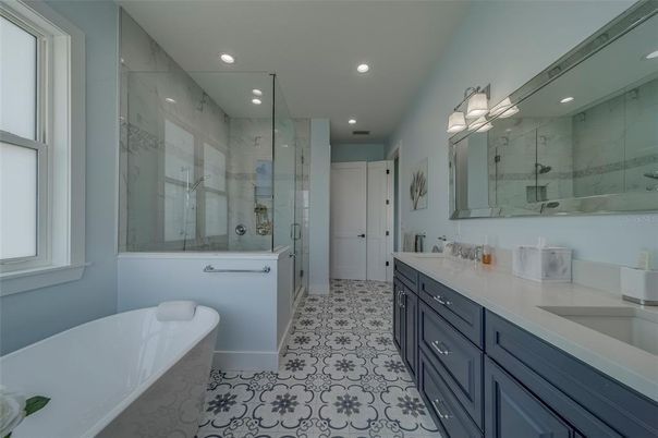 Bathroom, Dual Sink Vanities, Glass Shower, Interior, Marble Walls, Recessed Lighting
