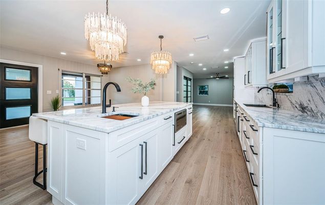 Chandelier, Interior, Kitchen, Recessed Lighting, Stainless Steel Appliances, Wood Texture Flooring