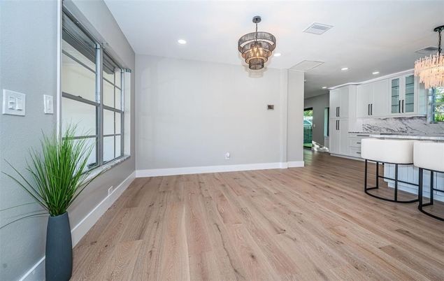 Chandelier, Interior, Kitchen, Marble Walls, Recessed Lighting, Wood Texture Flooring