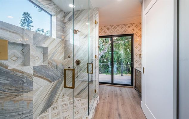 Bathroom, Glass Shower, Interior, Marble Walls, Recessed Lighting, Wood Texture Flooring