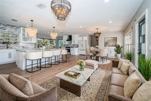 Chandelier, Dining room, Interior, Kitchen, Living room, Marble Walls, Pendant Lights, Recessed Lighting, Wood Texture Flooring