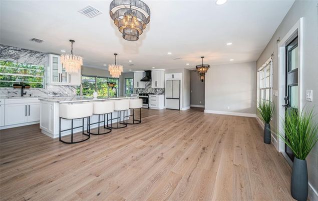 Chandelier, Interior, Kitchen, Marble Walls, Recessed Lighting, Wood Texture Flooring