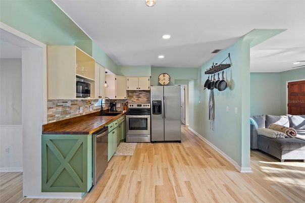 Interior, Kitchen, Recessed Lighting, Stainless Steel Appliances, Wood Texture Flooring