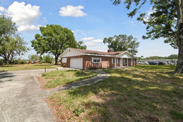 Attached, Backyard, Exterior, Facade, Brick Facade, Ranch