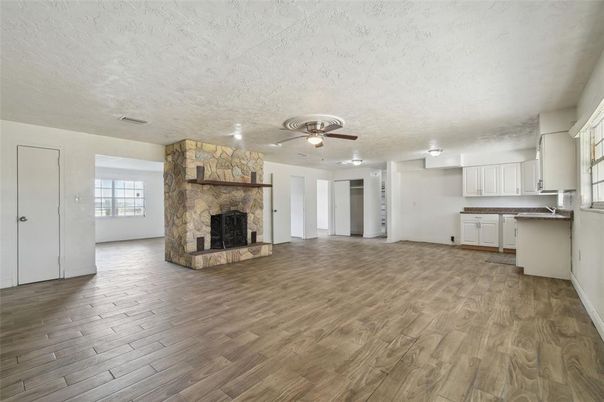 Empty room, Fireplace, Interior, Stone Walls, Wood Texture Flooring