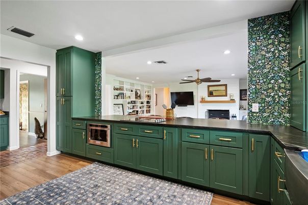 Fireplace, Interior, Kitchen, Recessed Lighting, Wood Texture Flooring