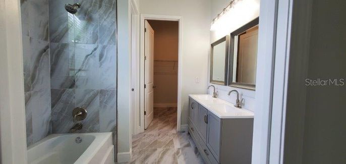 Bathroom, Dual Sink Vanities, Interior, Marble, Marble Walls, Wood Texture Flooring