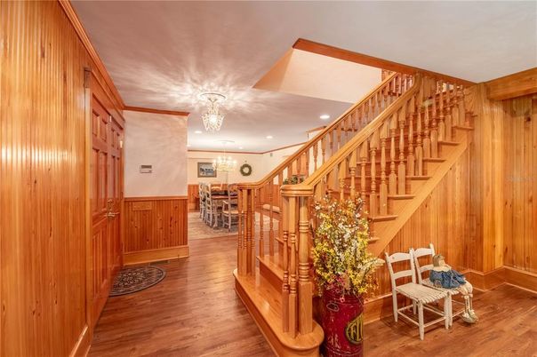 Chandelier, Dining room, Interior, Recessed Lighting, Wood Texture Flooring, Wooden Walls
