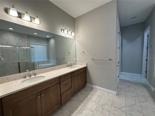 Bathroom, Dual Sink Vanities, Glass Shower, Interior, Marble, Recessed Lighting