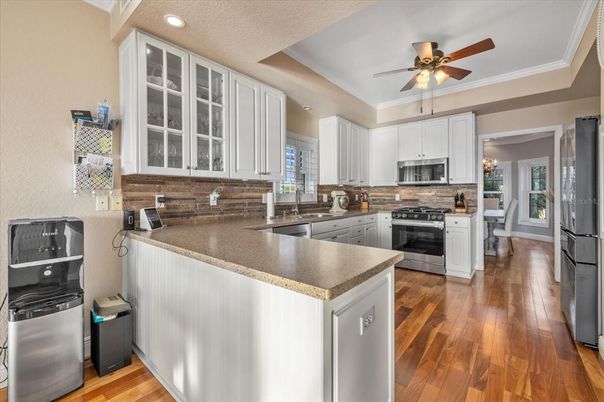 Interior, Kitchen, Recessed Lighting, Stainless Steel Appliances, Wood Texture Flooring