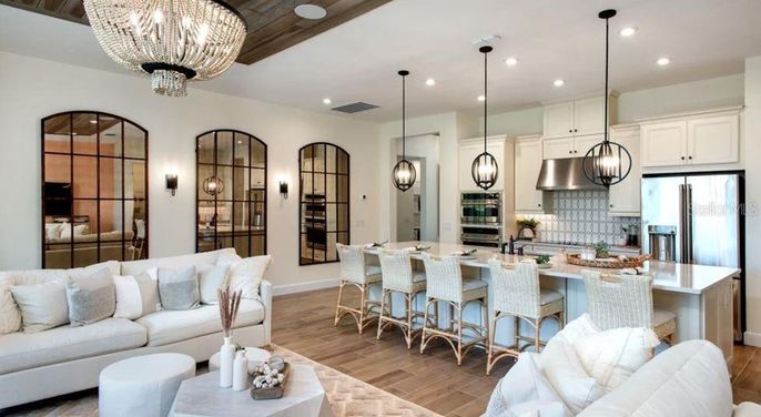 Chandelier, Interior, Kitchen, Living room, Pendant Lights, Recessed Lighting, Stainless Steel Appliances, Wooden Ceilings, Wood Texture Flooring