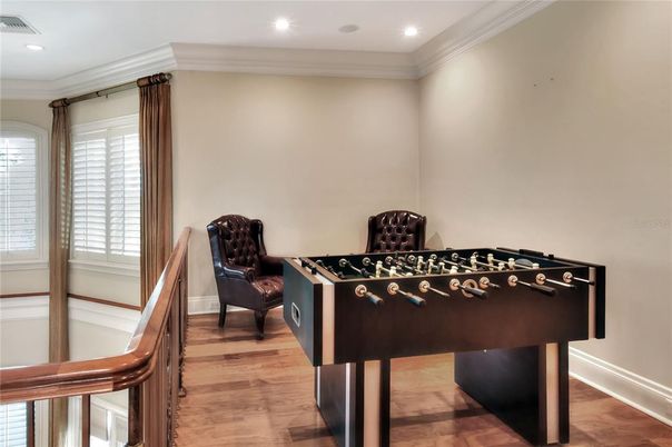 Billiard Table, Fireplace, Game Room, Interior, Recessed Lighting, Wood Texture Flooring