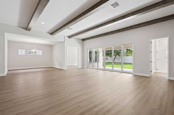 Chandelier, Empty room, Interior, Recessed Lighting, Wooden Beams, Wood Texture Flooring