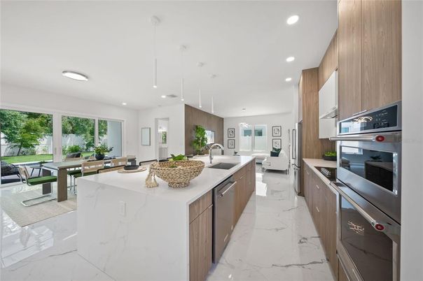 Dining room, Interior, Kitchen, Marble, Pendant Lights, Recessed Lighting, Stainless Steel Appliances