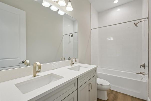 Bathroom, Dual Sink Vanities, Interior, Recessed Lighting, Wood Texture Flooring