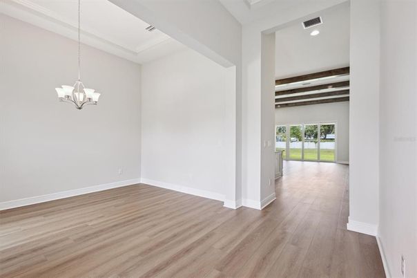 Chandelier, Empty room, Interior, Recessed Lighting, Wooden Beams, Wood Texture Flooring