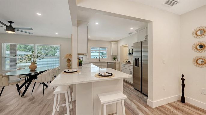 Dining room, Interior, Kitchen, Recessed Lighting, Stainless Steel Appliances, Wood Texture Flooring