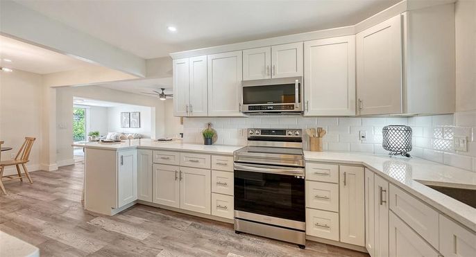 Interior, Kitchen, Recessed Lighting, Stainless Steel Appliances, Wood Texture Flooring