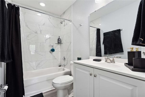 Bathroom, Interior, Marble Walls, Recessed Lighting, Wood Texture Flooring
