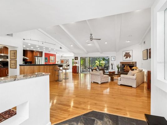 Fireplace, Interior, Kitchen, Living room, Recessed Lighting, Stainless Steel Appliances, Wood Texture Flooring