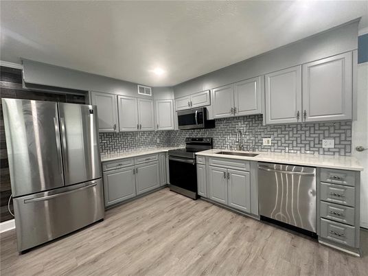 Interior, Kitchen, Recessed Lighting, Stainless Steel Appliances, Wood Texture Flooring