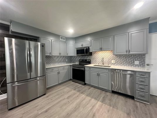 Interior, Kitchen, Recessed Lighting, Stainless Steel Appliances, Wood Texture Flooring