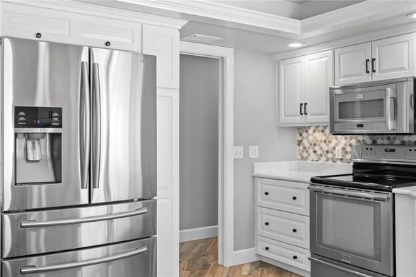 Interior, Kitchen, Recessed Lighting, Stainless Steel Appliances, Wood Texture Flooring