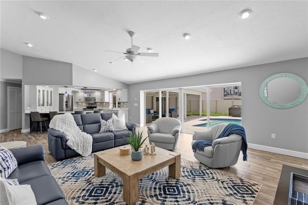 Dining room, Interior, Kitchen, Living room, Recessed Lighting, Stainless Steel Appliances, Wood Texture Flooring