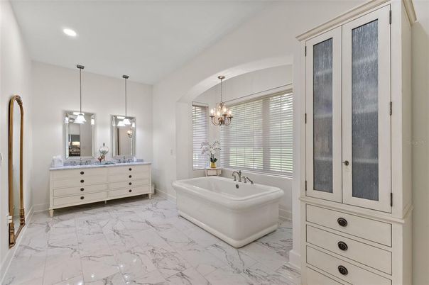 Bathroom, Chandelier, Dual Sink Vanities, Free Standing Baths, Interior, Marble, Pendant Lights, Recessed Lighting