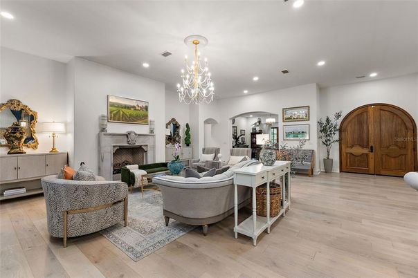 Chandelier, Fireplace, Interior, Living room, Recessed Lighting, Wood Texture Flooring