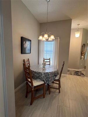 Chandelier, Dining room, Interior, Pendant Lights, Wood Texture Flooring