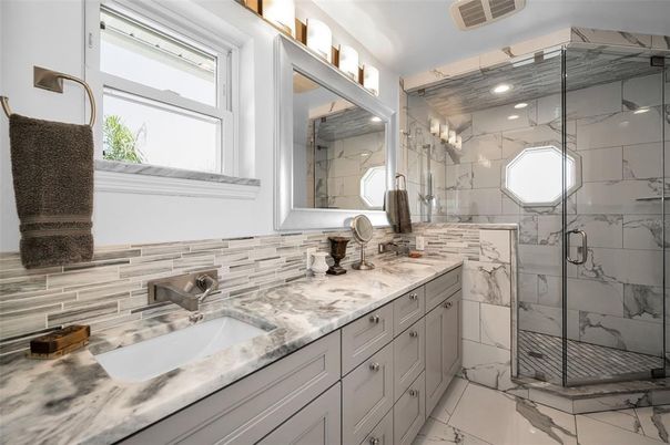 Bathroom, Dual Sink Vanities, Glass Shower, Interior, Marble, Marble Walls