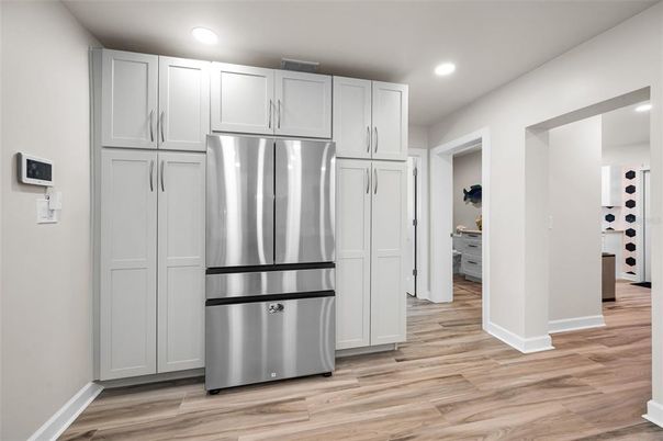Interior, Kitchen, Recessed Lighting, Stainless Steel Appliances, Wood Texture Flooring