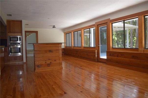 Empty room, Interior, Kitchen, Stainless Steel Appliances, Wood Texture Flooring