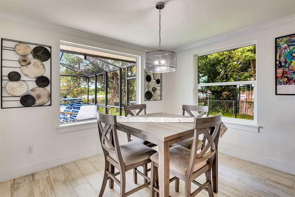 Dining room, Interior, Pendant Lights, Sun Room, Wood Texture Flooring