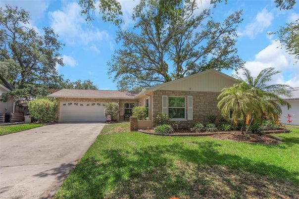 Attached, Backyard, Exterior, Facade, Brick Facade, Ranch