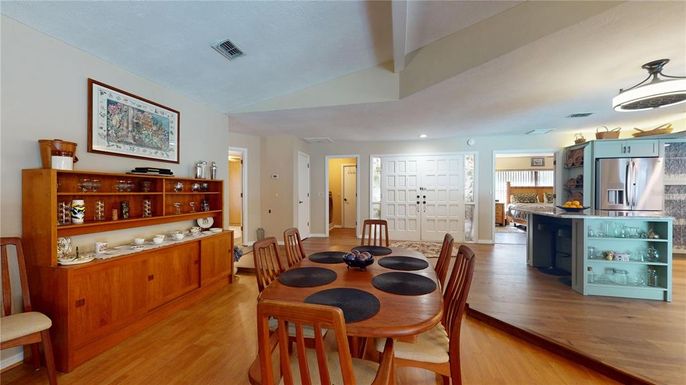 Dining room, Interior, Kitchen, Recessed Lighting, Stainless Steel Appliances, Wood Texture Flooring