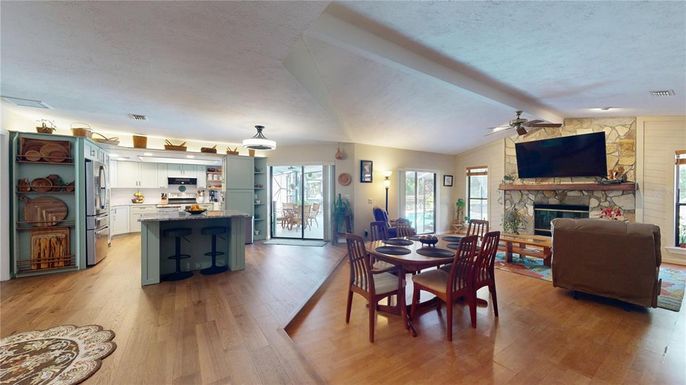Dining room, Fireplace, Interior, Kitchen, Living room, Stainless Steel Appliances, Wood Texture Flooring