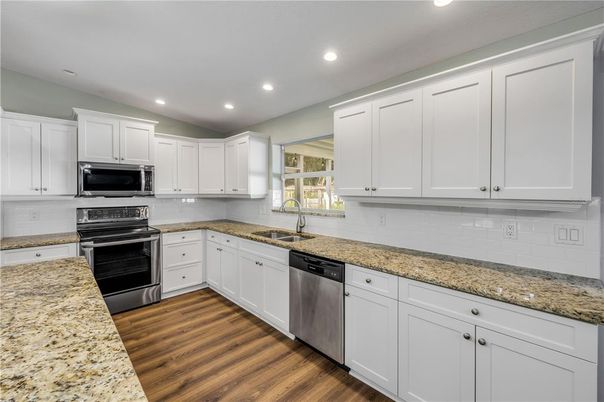 Interior, Kitchen, Recessed Lighting, Stainless Steel Appliances, Wood Texture Flooring