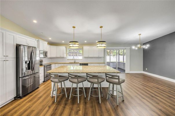 Interior, Kitchen, Pendant Lights, Recessed Lighting, Stainless Steel Appliances, Wood Texture Flooring