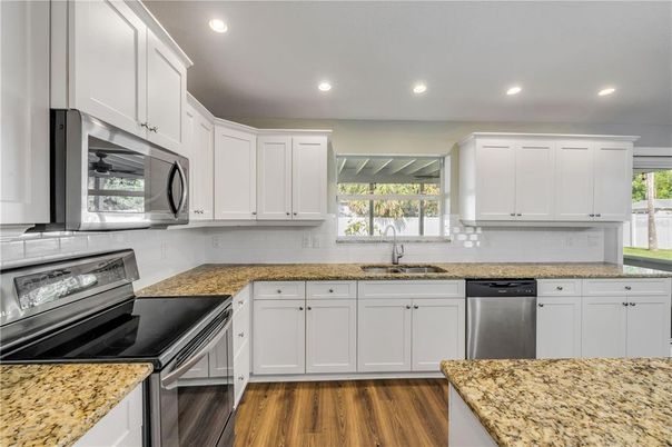 Interior, Kitchen, Recessed Lighting, Stainless Steel Appliances, Wood Texture Flooring