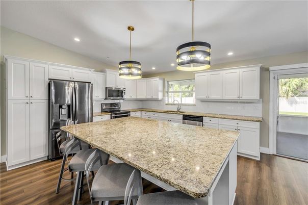 Interior, Kitchen, Pendant Lights, Recessed Lighting, Stainless Steel Appliances, Wood Texture Flooring