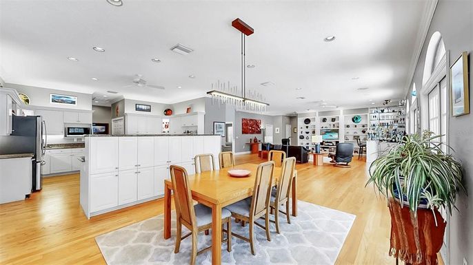 Dining room, Interior, Kitchen, Pendant Lights, Recessed Lighting, Stainless Steel Appliances, Wood Texture Flooring