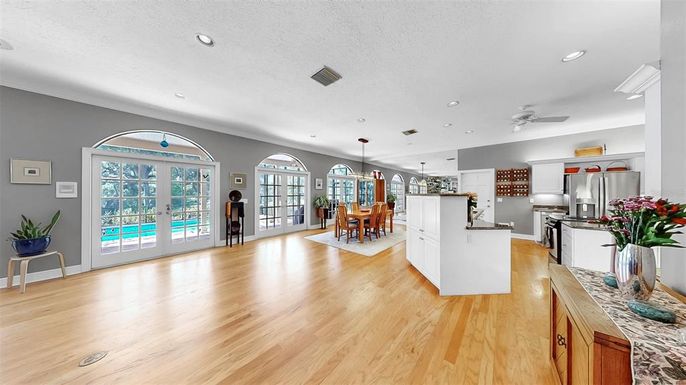 Dining room, Interior, Kitchen, Pendant Lights, Recessed Lighting, Stainless Steel Appliances, Wood Texture Flooring