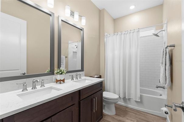 Bathroom, Dual Sink Vanities, Interior, Recessed Lighting, Wood Texture Flooring