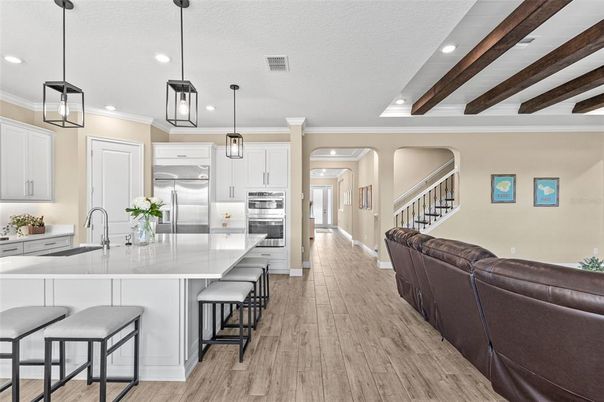 Interior, Kitchen, Living room, Pendant Lights, Recessed Lighting, Stainless Steel Appliances, Wooden Beams, Wood Texture Flooring