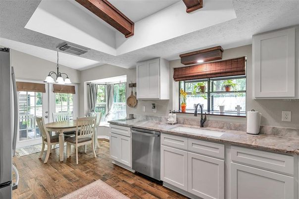 Dining room, Interior, Kitchen, Pendant Lights, Stainless Steel Appliances, Wooden Beams, Wood Texture Flooring