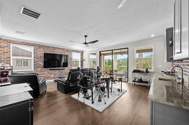Dining room, Interior, Living room, Recessed Lighting, Stone Walls, Wood Texture Flooring