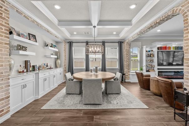 Chandelier, Dining room, Interior, Living room, Recessed Lighting, Stone Walls, Wood Texture Flooring