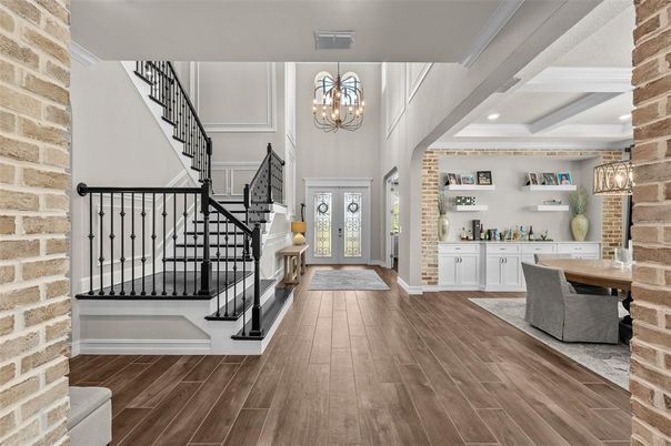 Chandelier, Dining room, Interior, Pendant Lights, Recessed Lighting, Stone Walls, Wood Texture Flooring
